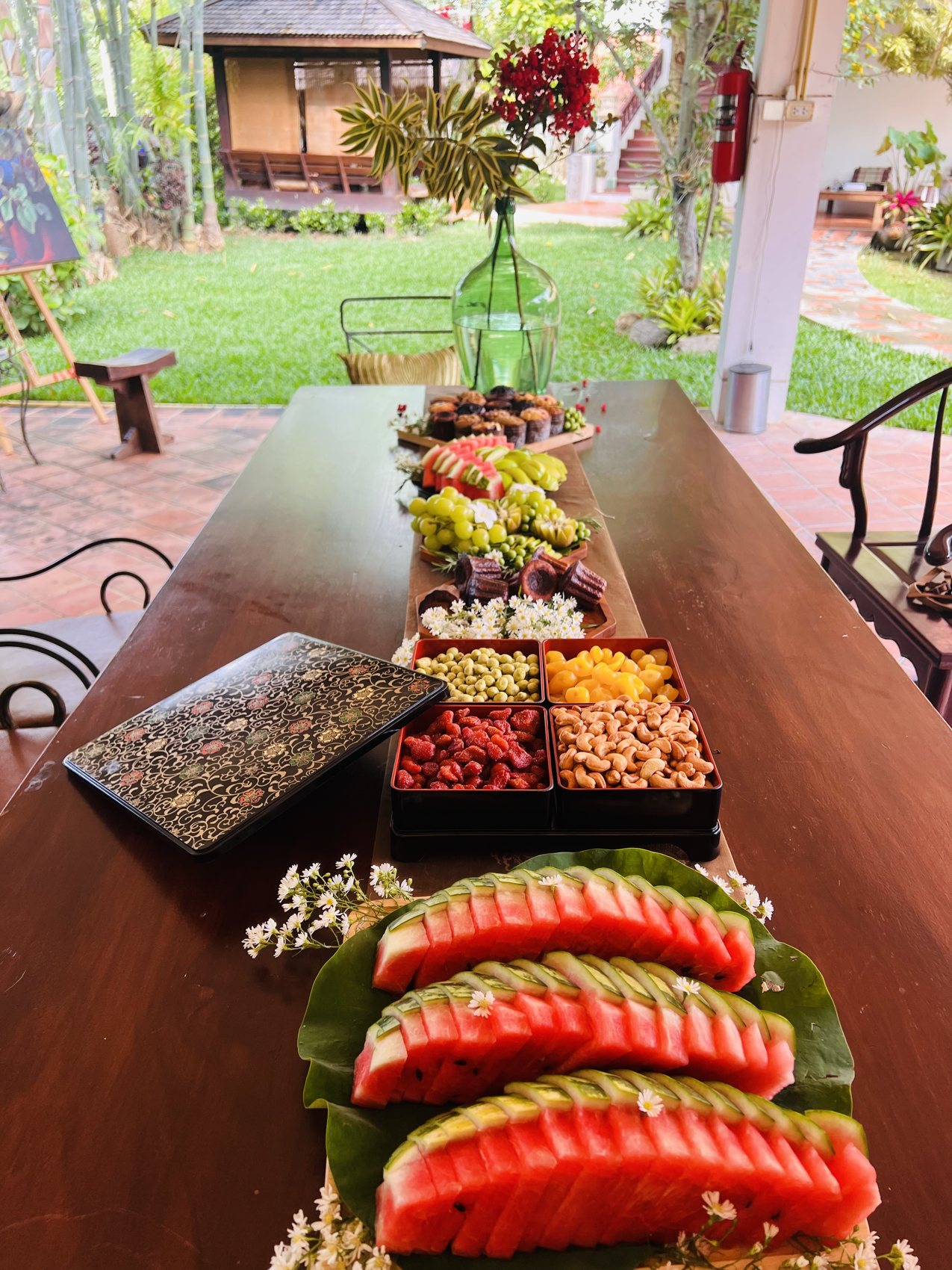 Fruit and dishes laid along the long table