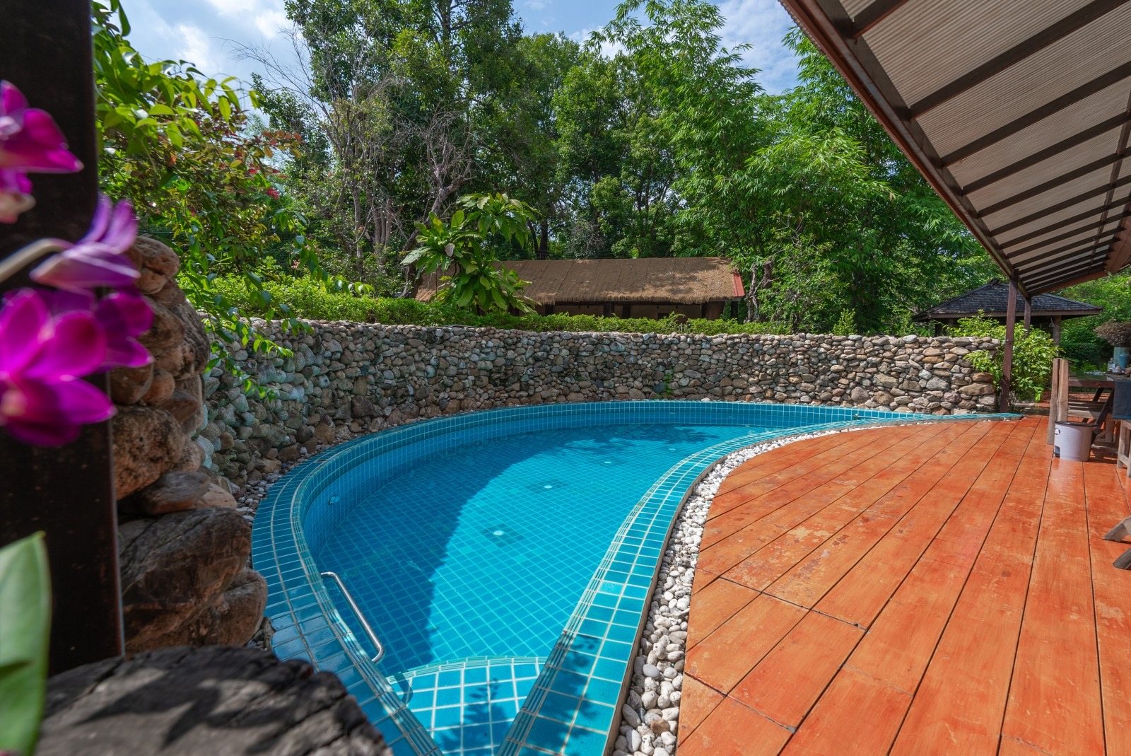 The pool and bamboo pavilion in the garden