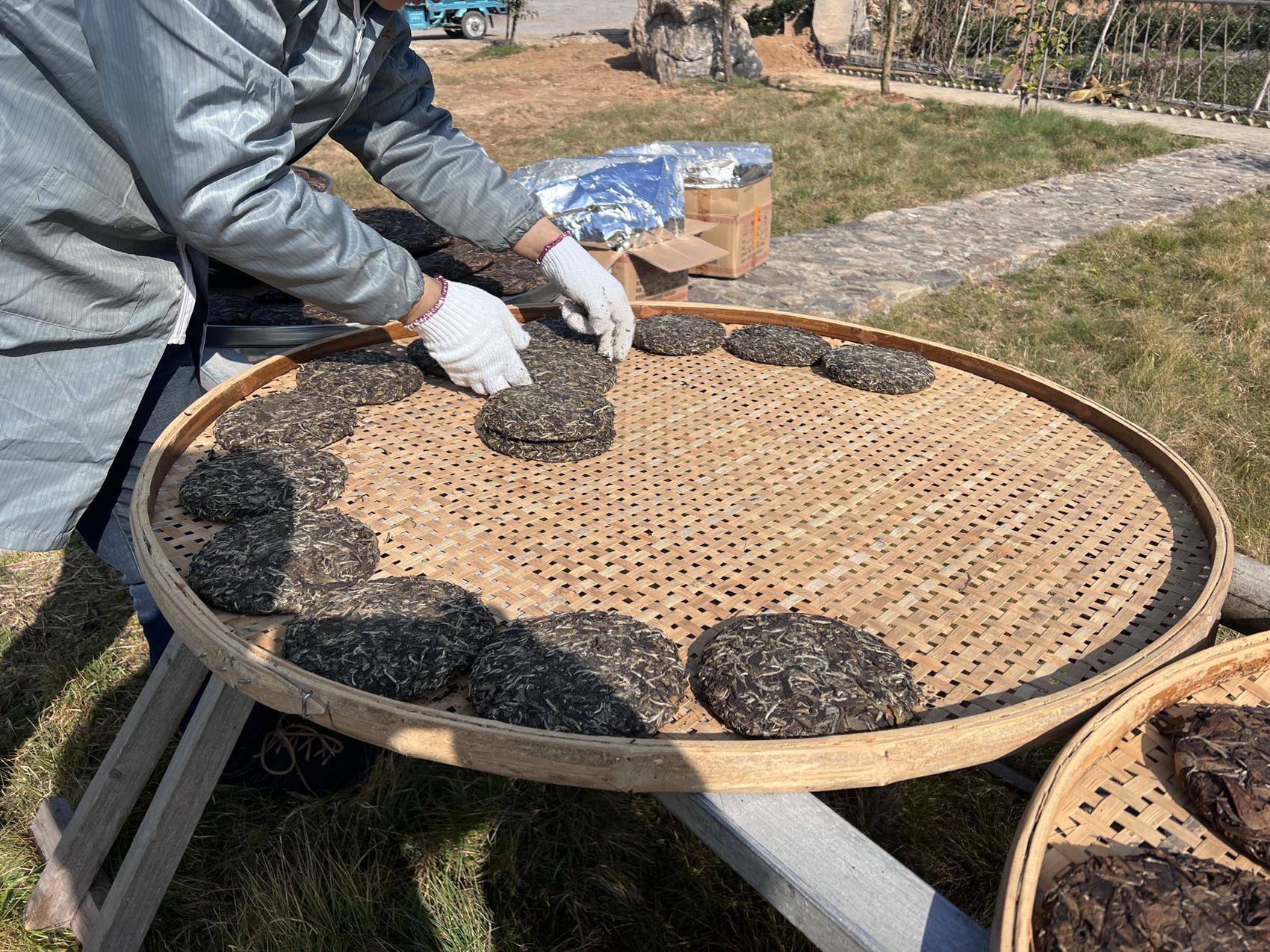 Cakes arranged on a round bamboo tray