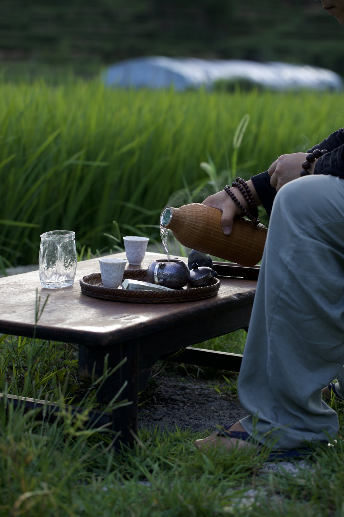 Tea set on a low table in the rice fields