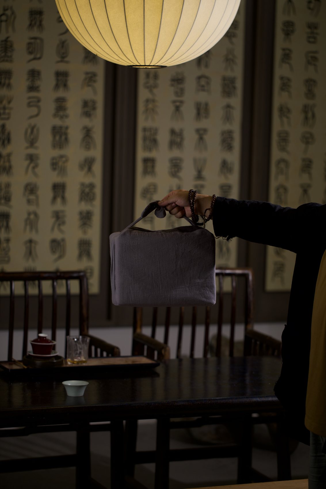 The tea room hung with calligraphy