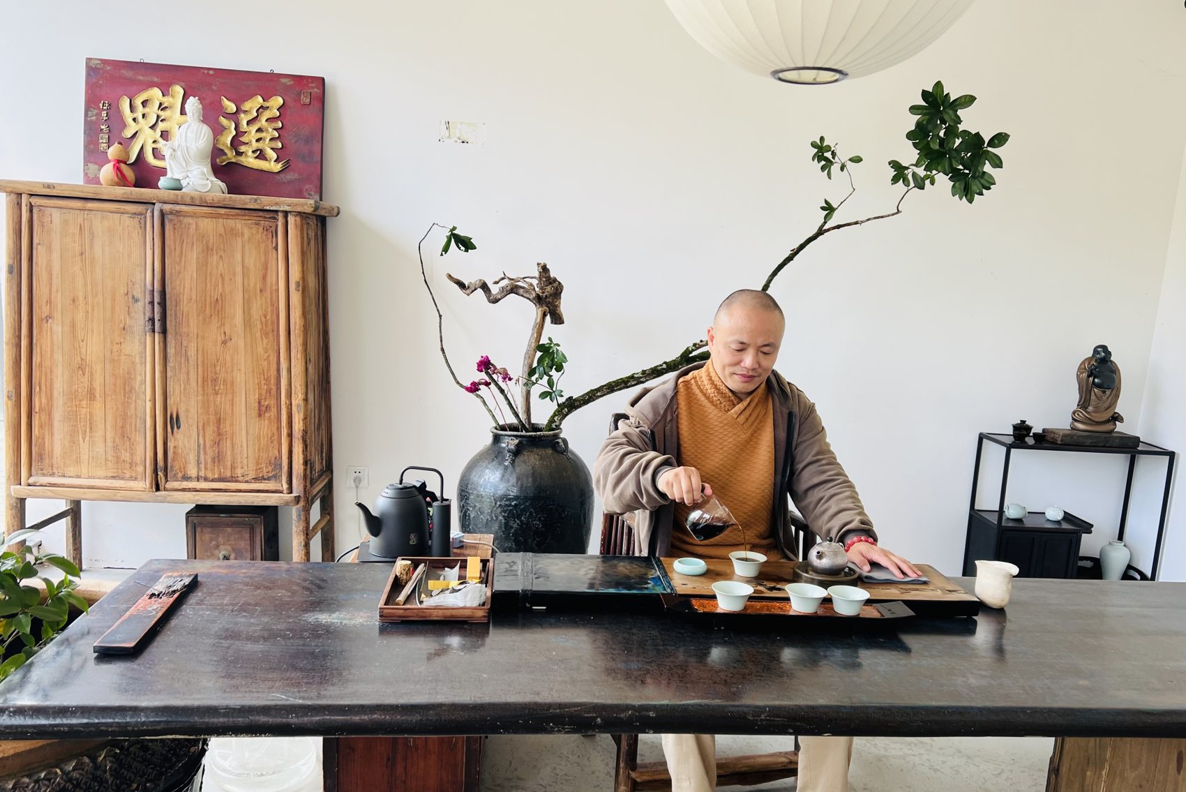 Ernan at the tea table in his studio