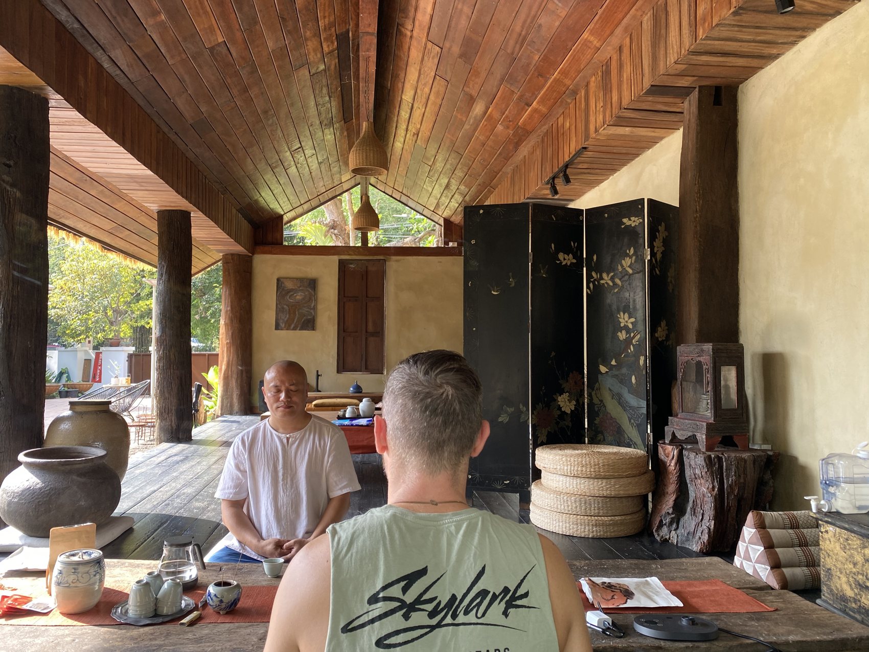 Ernan teaching a guest in the pavilion