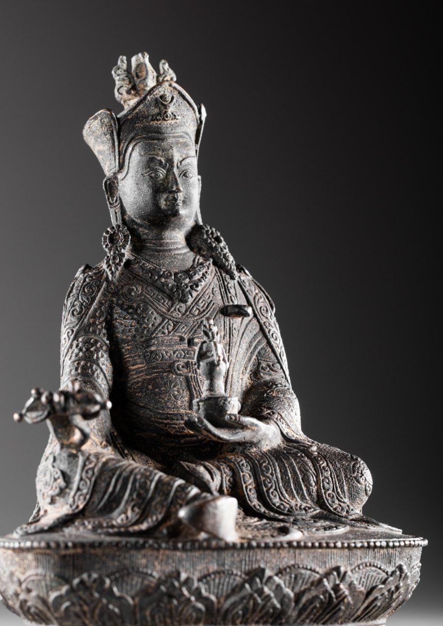 A gilt Buddha head from the collection