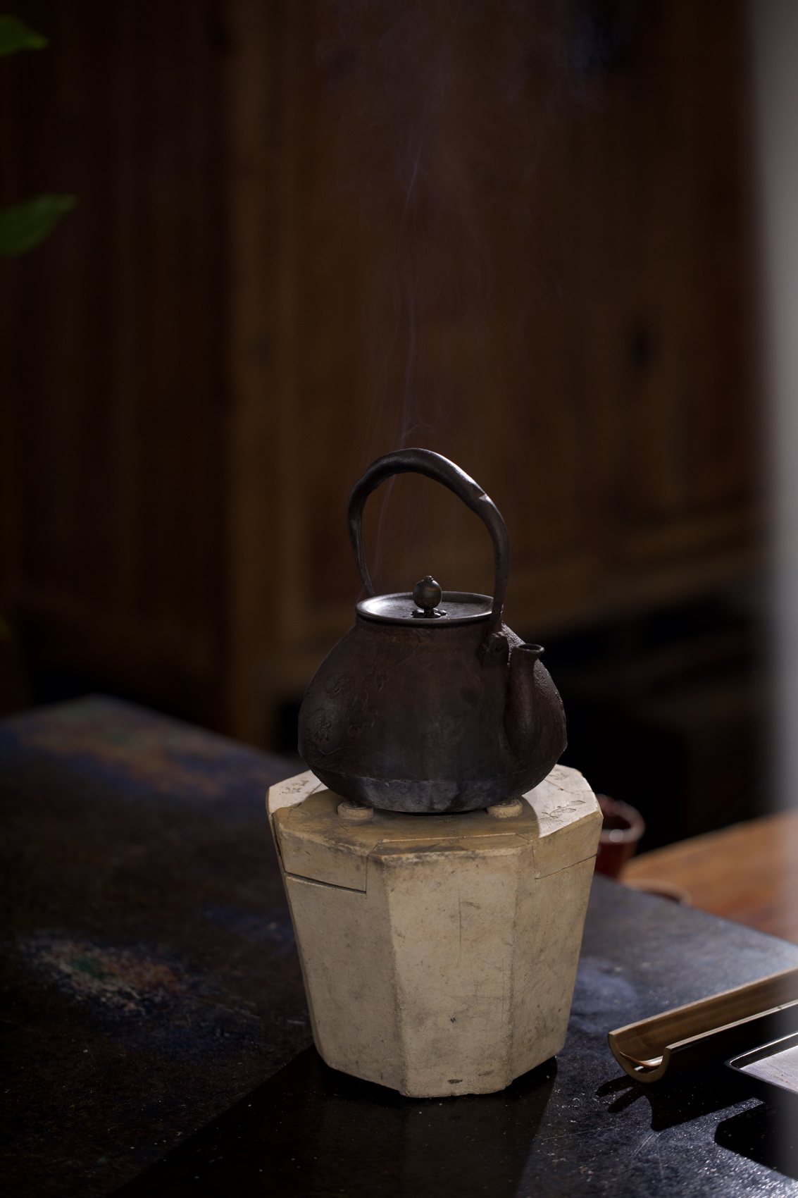 Iron kettle on the stone